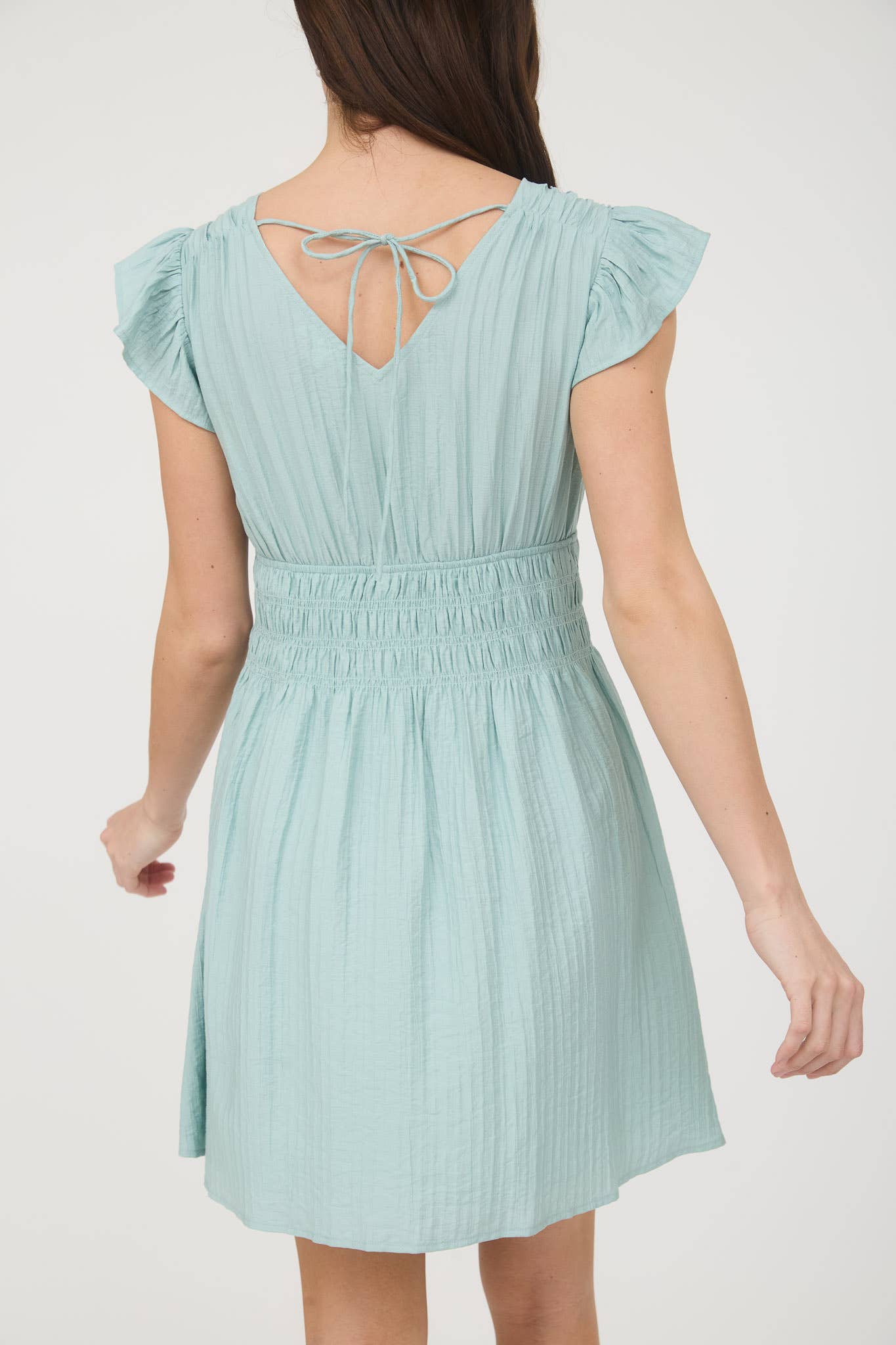 Stylish RUFFLE SLEEVE MINI DRESS with shirred waist and V neckline, perfect for any occasion.