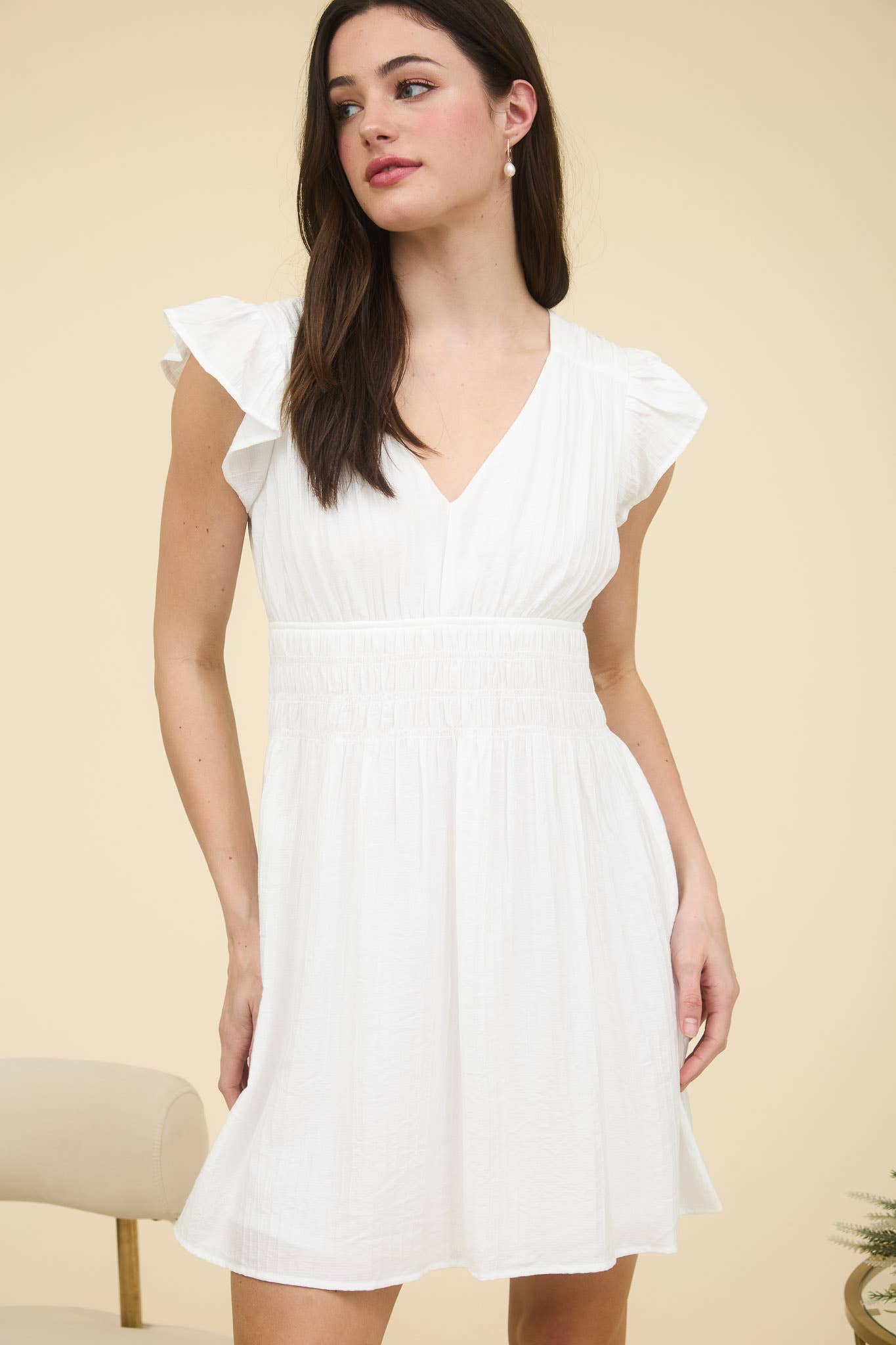 Stylish RUFFLE SLEEVE MINI DRESS features a V neckline and shirred elastic waist, perfect for any occasion.