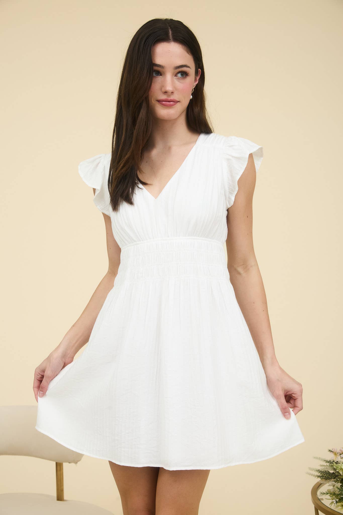 Stylish RUFFLE SLEEVE MINI DRESS featuring a V neckline and shirred elastic waist, perfect for any occasion.