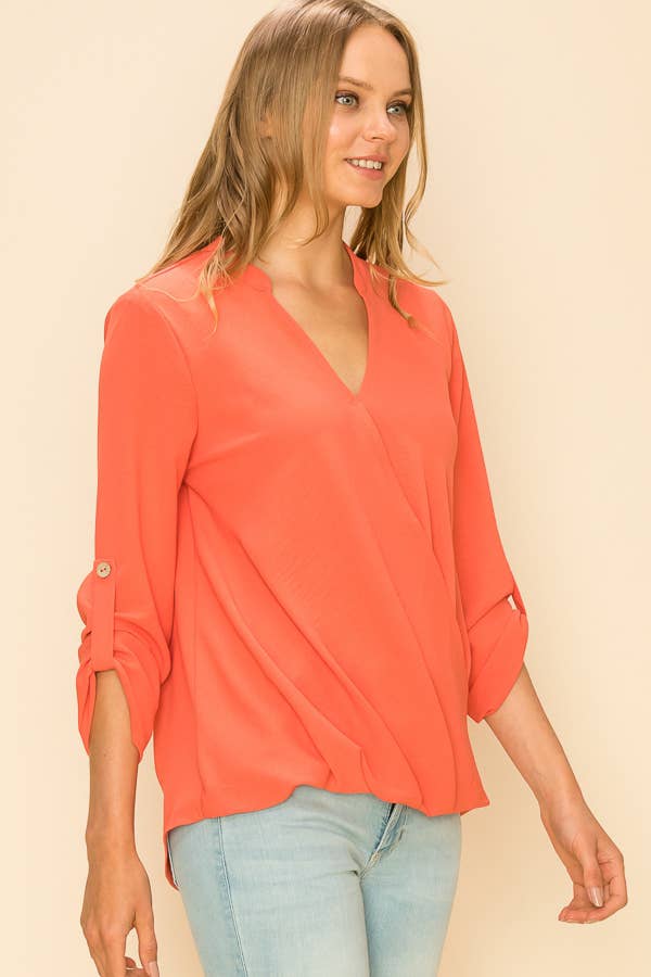 Stylish WRAP COLLAR BLOUSE featuring a faux wrap design, V-neckline, and buttoned cuffs for a sophisticated look.
