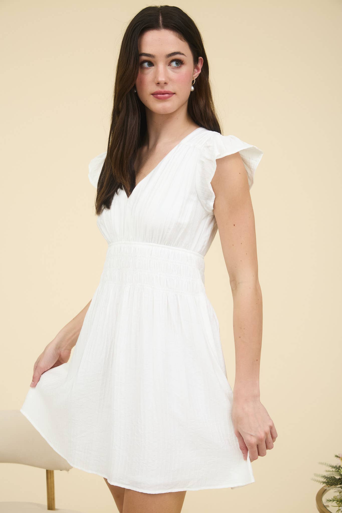 Stylish RUFFLE SLEEVE MINI DRESS featuring a V neckline and shirred elastic waist, perfect for any occasion.