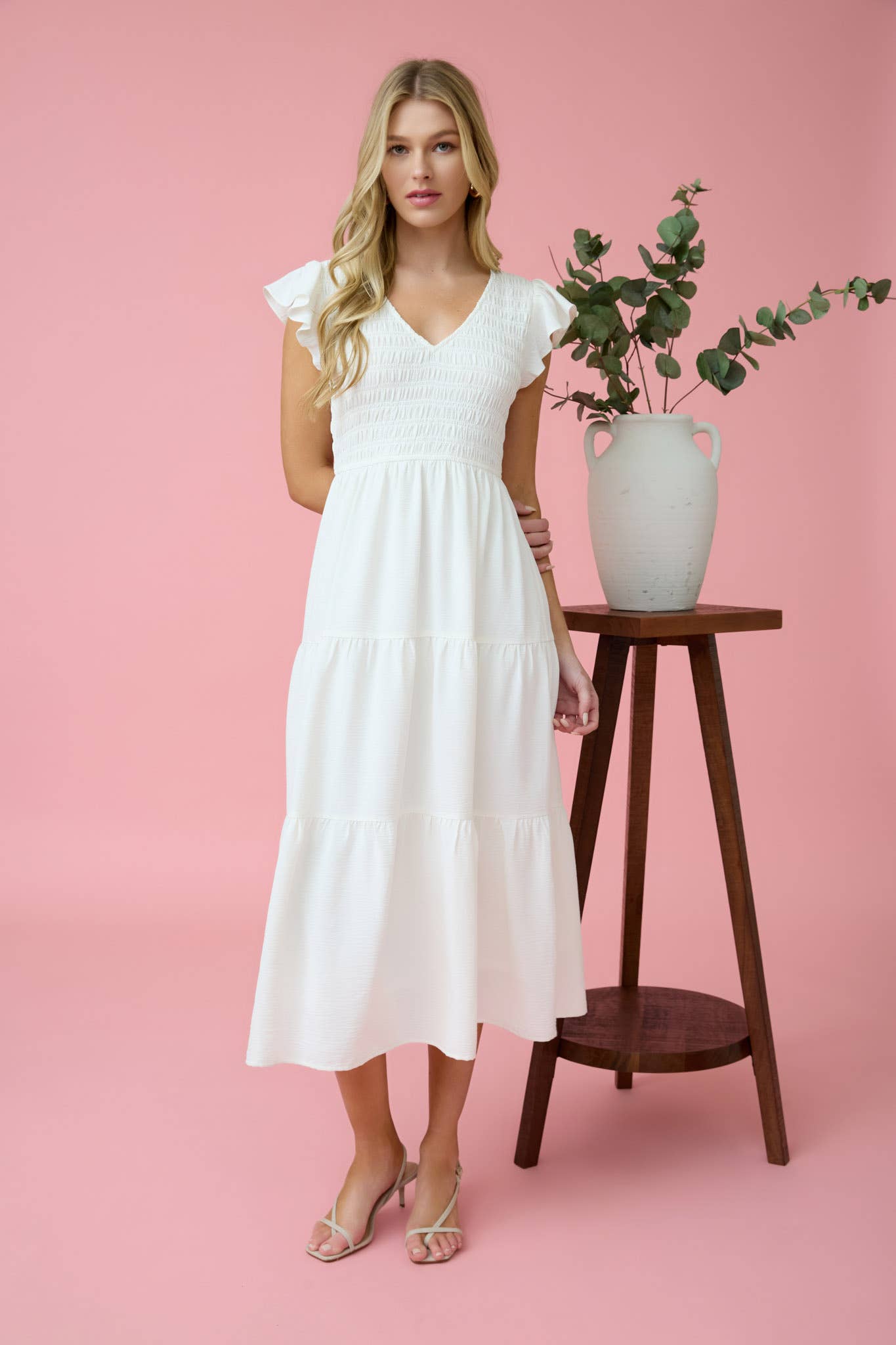 Stylish FLUTTER SLEEVE MAXI DRESS featuring a smocked bodice and tiered skirt, perfect for any occasion.