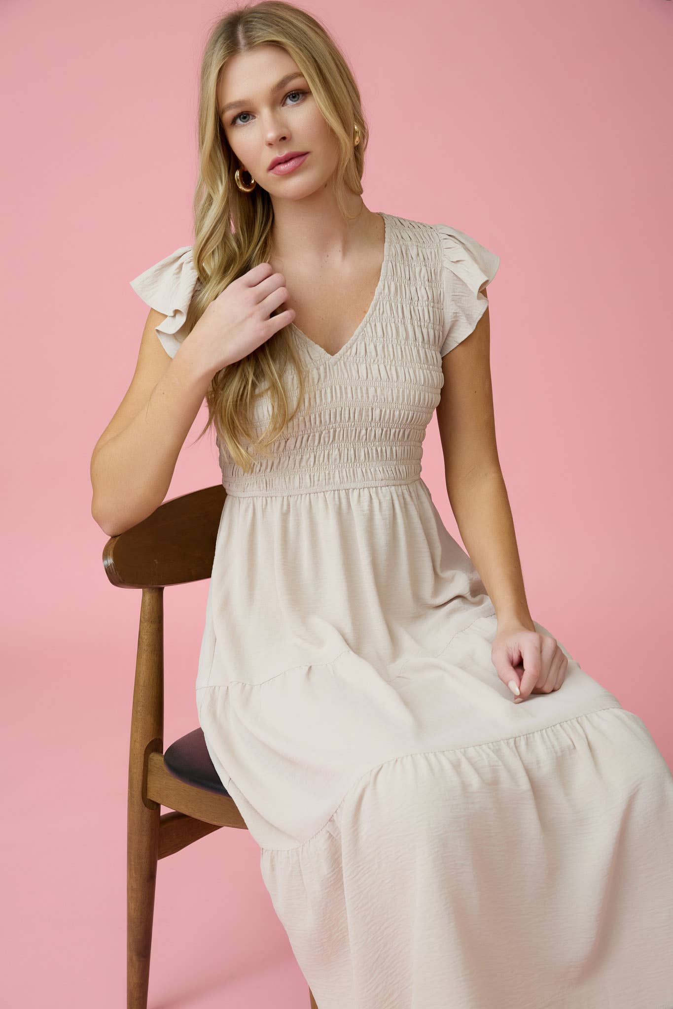 Chic FLUTTER SLEEVE MAXI DRESS with smocked bodice and tiered skirt, perfect for any occasion. Shop now!