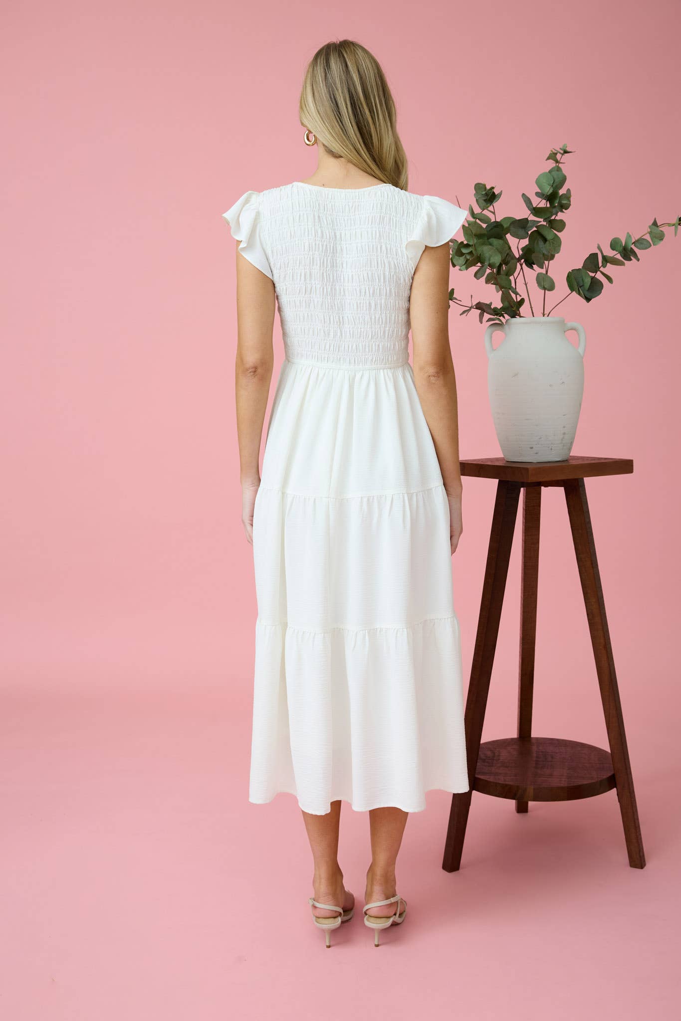 Elegant FLUTTER SLEEVE MAXI DRESS featuring a smocked bodice and tiered skirt, perfect for any occasion.
