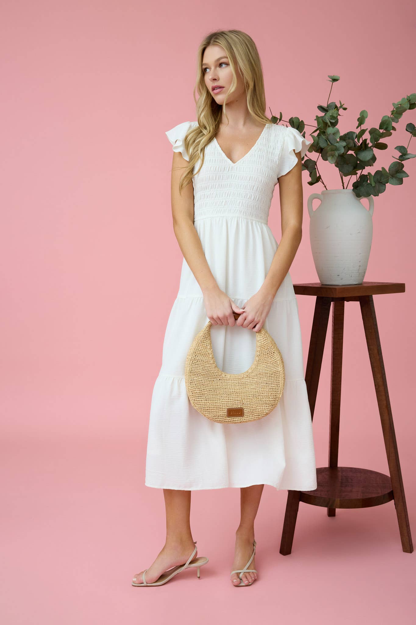 Stylish FLUTTER SLEEVE MAXI DRESS with smocked bodice and tiered skirt, perfect for any occasion.