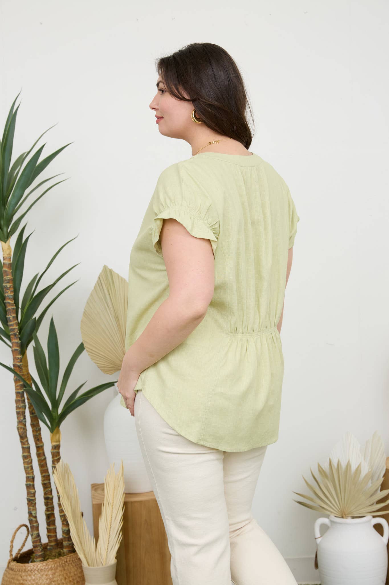 Curvy Ruched Sleeve Linen Blouse in light green, featuring elastic ruched sleeves and a split neckline for a stylish look.