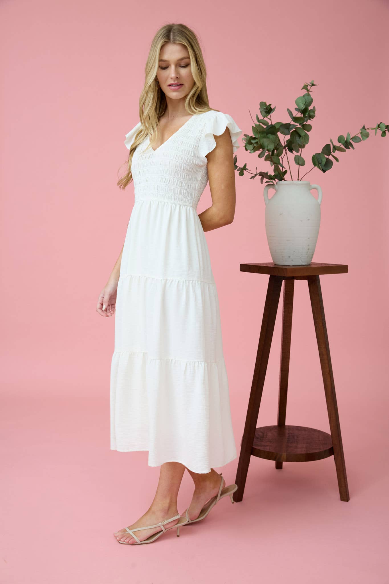 Elegant FLUTTER SLEEVE MAXI DRESS features a smocked bodice and tiered skirt, perfect for any occasion.