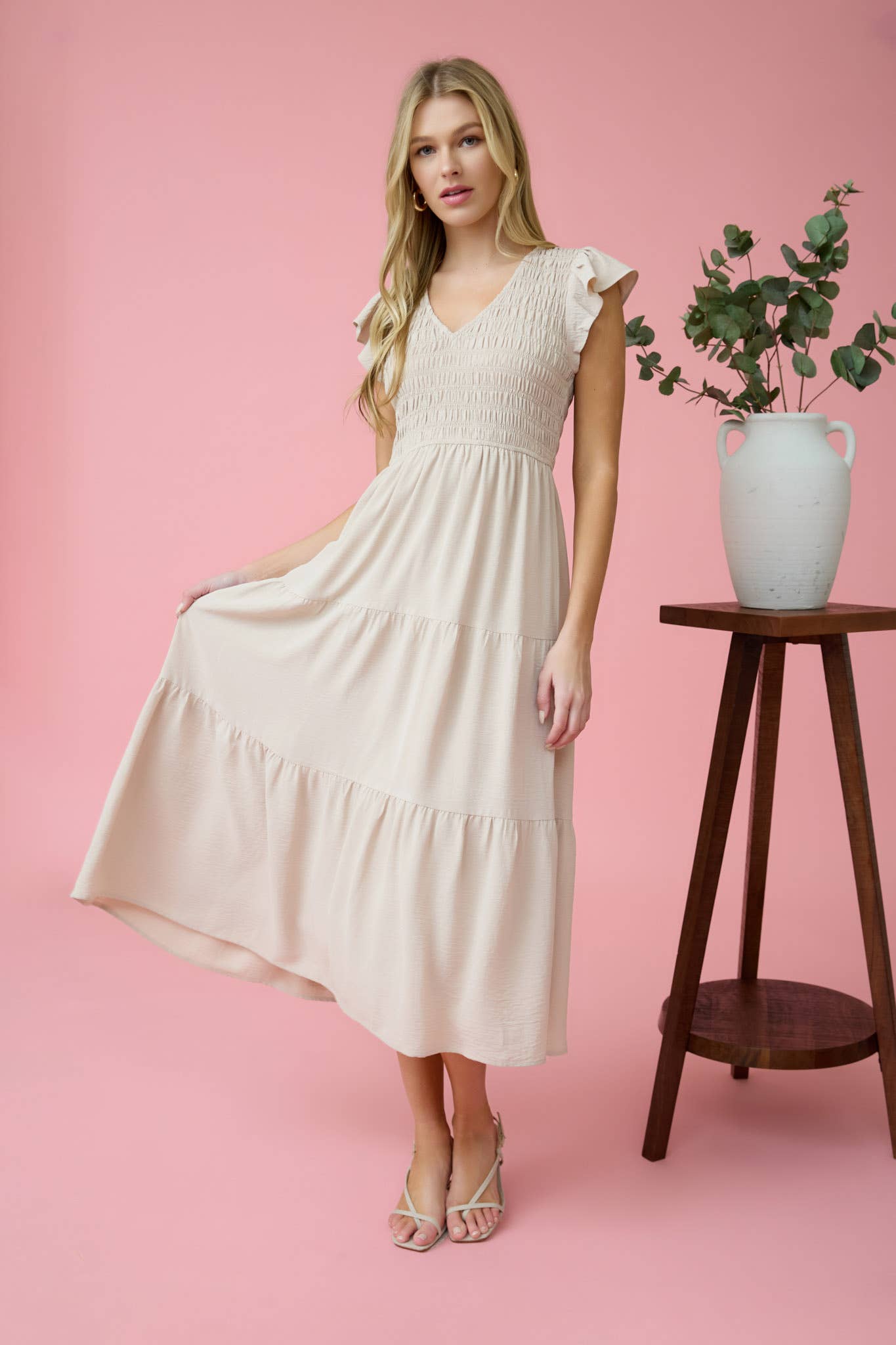Stylish FLUTTER SLEEVE MAXI DRESS featuring a smocked bodice and tiered skirt, perfect for any occasion.