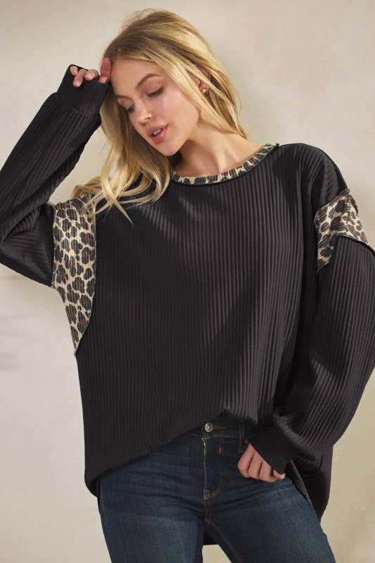 Animal Contrast Top in black rib knit with leopard-print panels on shoulders and sleeves.