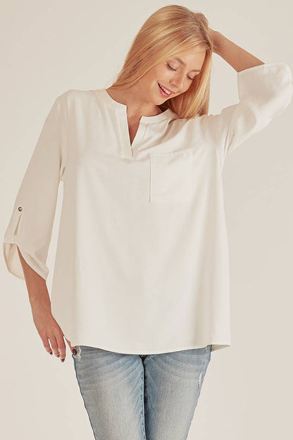 Stylish Pocket Blouse with front pocket and loose fit, perfect for various occasions at your favorite store.
