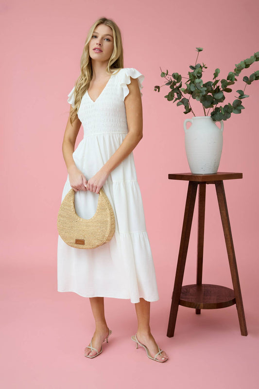 Stylish FLUTTER SLEEVE MAXI DRESS with smocked bodice and tiered skirt, perfect for any occasion.