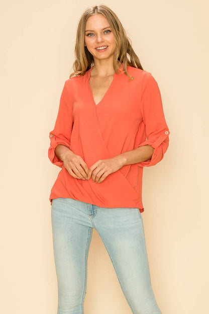 Stylish WRAP COLLAR BLOUSE with V-neck, long sleeves, and asymmetrical hem, perfect for a sophisticated look.