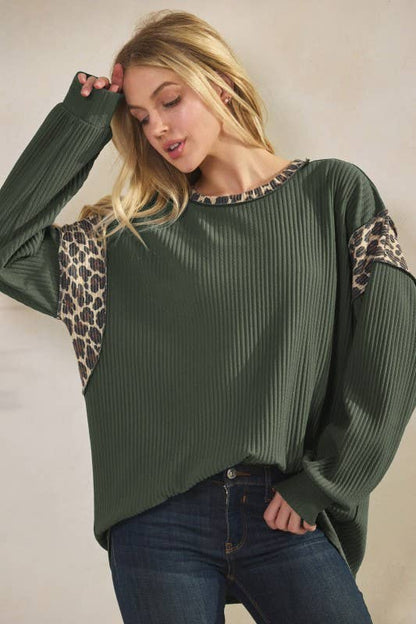 Animal Contrast Top in dark green rib-knit with leopard print panels on shoulders and long sleeves.