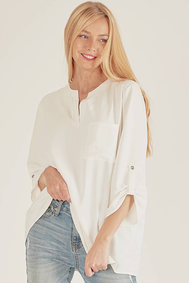 Stylish Pocket Blouse with front pocket and loose fit, perfect for versatile outfits from your favorite store.