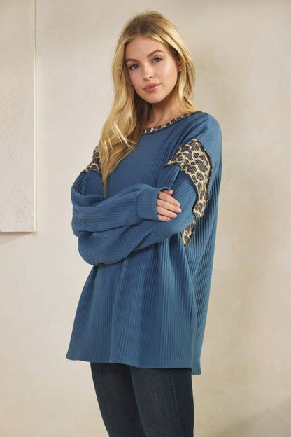 Oversized blue Animal Contrast Top with leopard-print sleeve panels, ribbed knit, long sleeves, round neck.