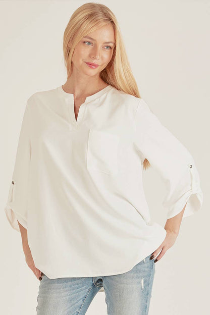 Stylish Pocket Blouse with a front pocket and loose fit, perfect for versatile, everyday wear at your favorite store.